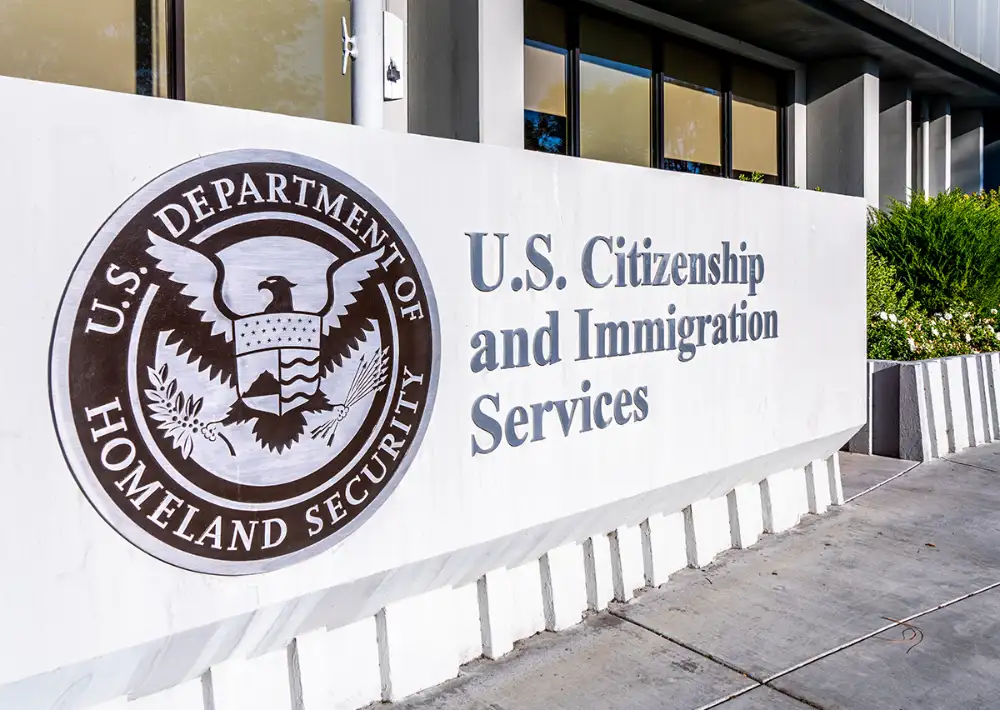 USCIS building and Homeland Security seal
